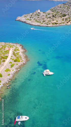 Fototapeta Naklejka Na Ścianę i Meble -  Aerial bird's eye view photo taken by drone from bay and iconic Monastery of Panormitis, Symi island, Dodecanese, Greece