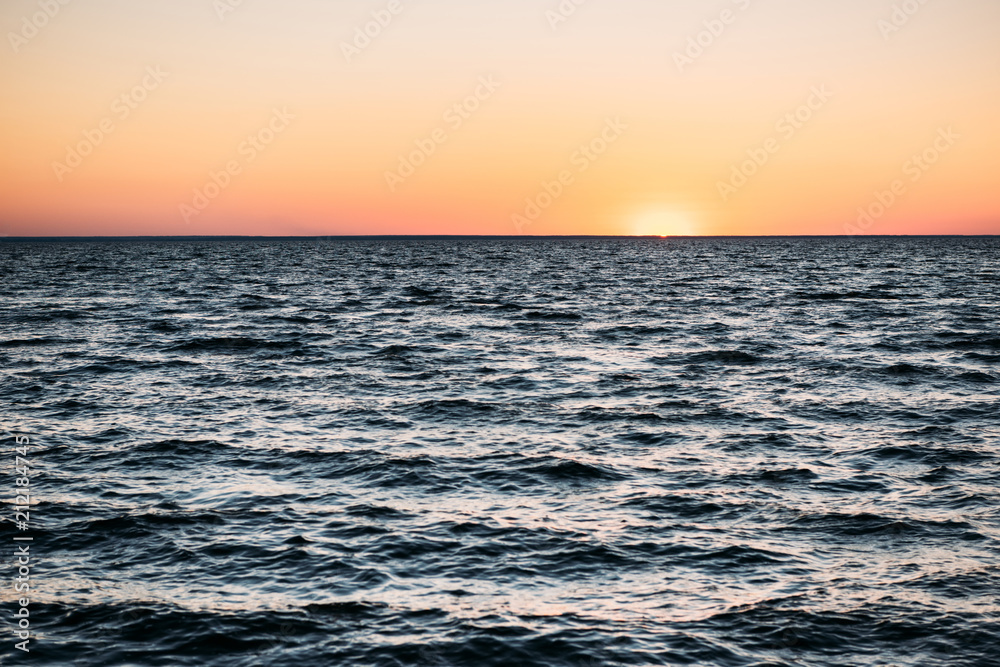 majestic sea view with waves and beautiful sunset