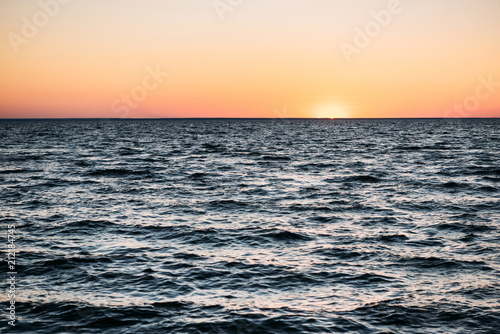 majestic sea view with waves and beautiful sunset