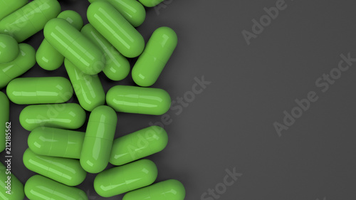 Pile of green medicine capsules