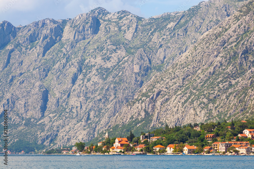 View on the old european city at boka-kotor bay surrounded mountains in Adriatic sea coastline, Montenegro