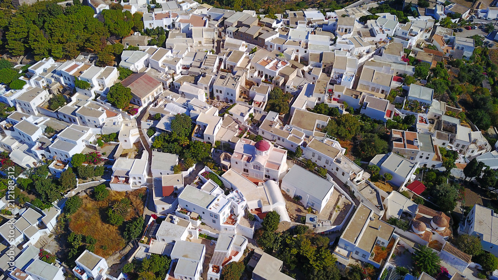 Aerial bird's eye view photo taken by drone of Massive fortified stone Monastery of Saint John the Apostle, Patmos island, Greece
