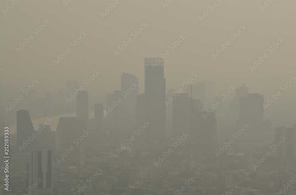 Obraz premium Modern office tower with skyscraper in the fog, Bangkok city Thailand
