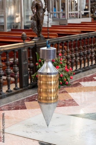 Mexico City, Mexico, Zócalo, The interior of the beautiful cathedral on Zocalo Square. A big hanging pendulum