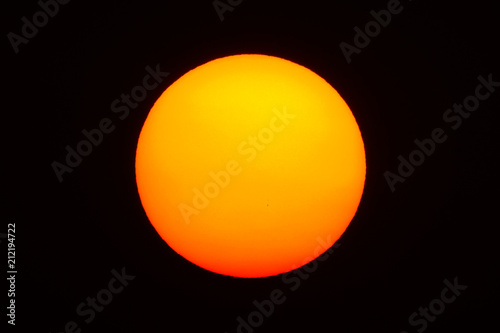 Isolate big red sun with black background