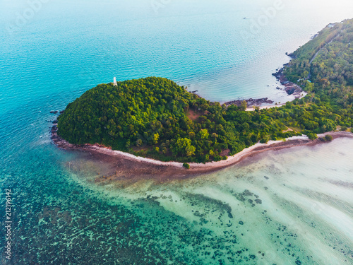 Fototapeta Naklejka Na Ścianę i Meble -  Aerial view of beautiful tropical beach and sea with trees on island