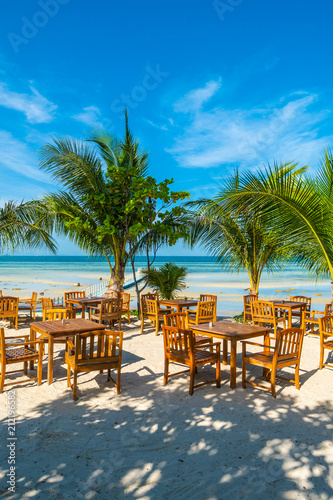 Umbrella and chair around beach and sea for travel and vacation