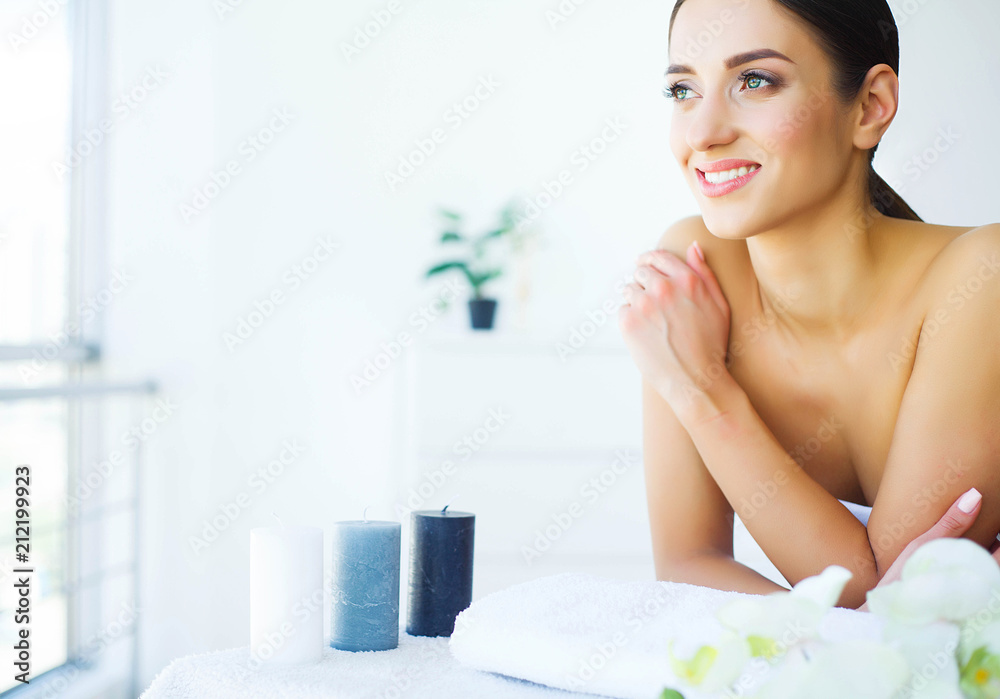 Beauty. Young Girl in Beauty Salon. Brunette Woman with Green Eyes. Lying on the Massage Tables. Clean and Fresh Skin. Skin Care. High Resolution Beauty. Young Girl in Beauty Salon. Brunette Woman with Green Eyes. Lying on the Massage Tables. Clean and Fresh Skin. Skin Care. High Resolution