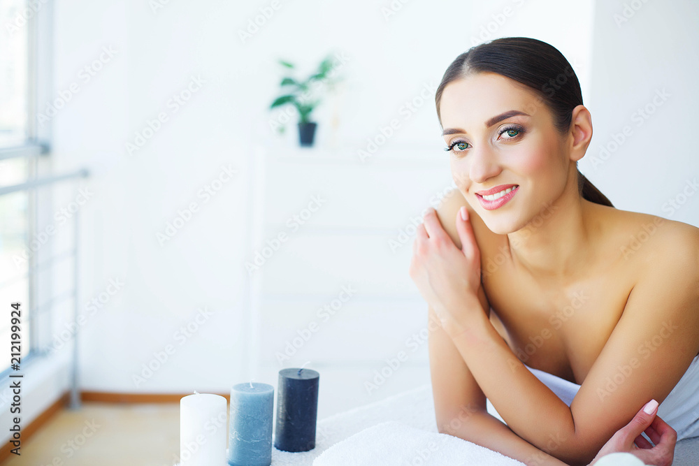 Beauty. Young Girl in Beauty Salon. Brunette Woman with Green Eyes. Lying on the Massage Tables. Clean and Fresh Skin. Skin Care. High Resolution Beauty. Young Girl in Beauty Salon. Brunette Woman with Green Eyes. Lying on the Massage Tables. Clean and Fresh Skin. Skin Care. High Resolution