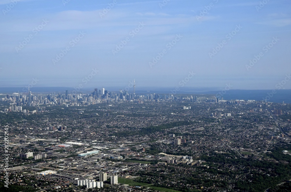 Toronto aerial view of the dense urban downtown area in the background