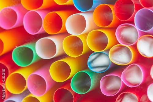 Close up to colorful straws background