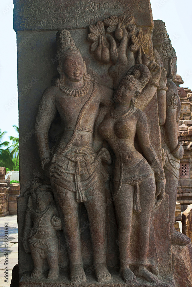 Carved figure of charming mithunas on the pillars of northern mukha mandapa, Virupaksha temple, Pattadakal temple complex, Pattadakal, Karnataka. Northwest view.