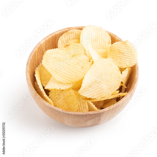 Potato chips in wooden bowl on a white background.