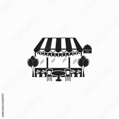 Children's cafe with the ballons, table, chairs, flowerpots and flannel. The fasade of the building. Children's party. Logo for restaurants and cafes for children