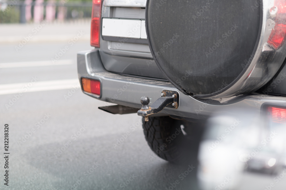 Trailer hitch on back of car truck rusted old used boat launch Stock