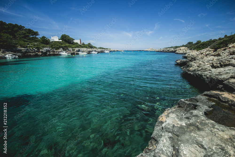turquoise water in Spanish Menorca like in Caribbean, clear and perfect for swimming and bathing