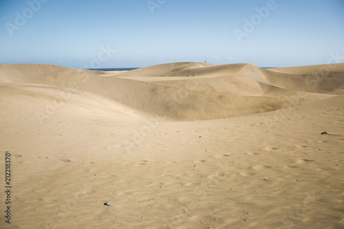 minimalistic view of sand dunes landscape, minimalism in nature, sand everywhere and windy weather, shapes and creations