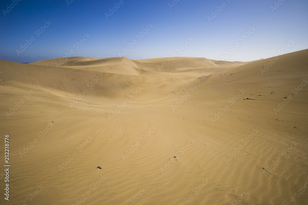 minimalistic view of sand dunes landscape, minimalism in nature, sand everywhere and windy weather, shapes and creations