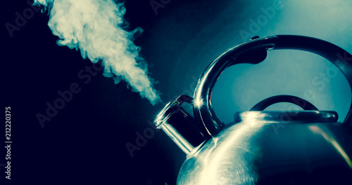 Canvas-taulu Kettle whistling, boiling kettle with steam texture on a black background