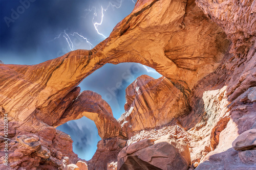 Double Arch during a storm in Arches National Park, Utah, USA