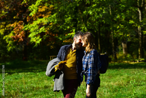 Couple in love walks in park. Man and woman