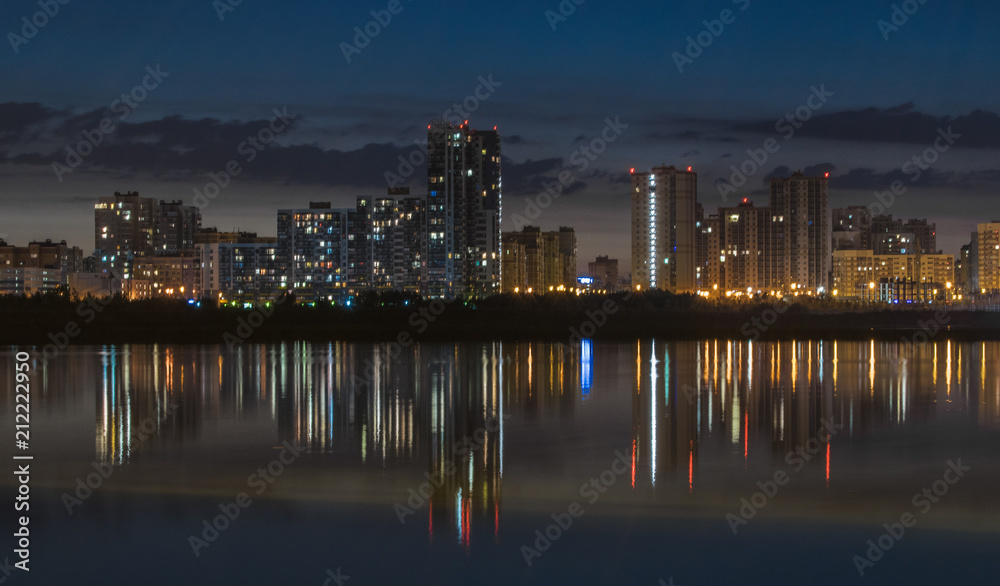 Residential area of Kazan, reflected in the waters of the river Kazanka. Russia