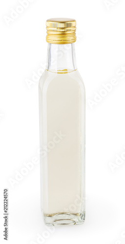 White vinegar in glass bottle isolated on white background with clipping path