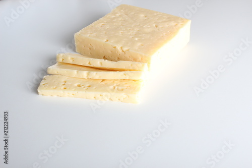 cheese cut into white background