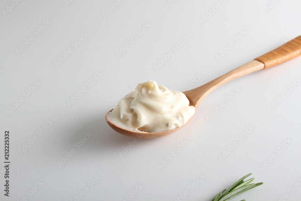 processed cheese in a spoon background processed cheese in a spoon background