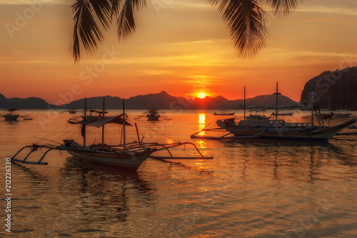  tropical landscape with traditional boats of the Philippines. Elnido, the island of Palawan.