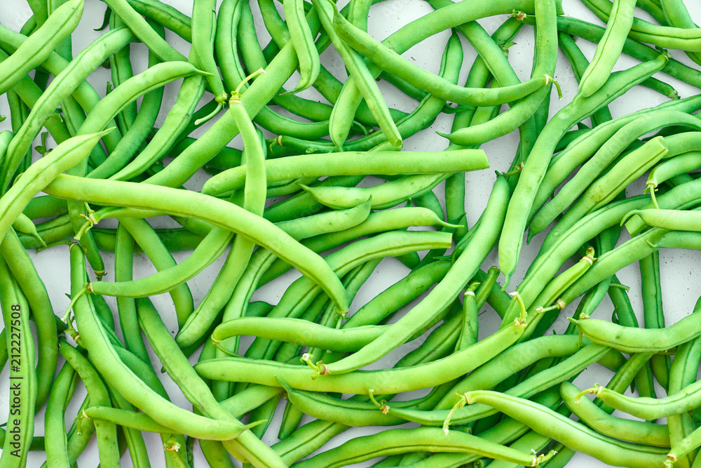 Pile of green beans, photographed on blurred background, natural fresh product