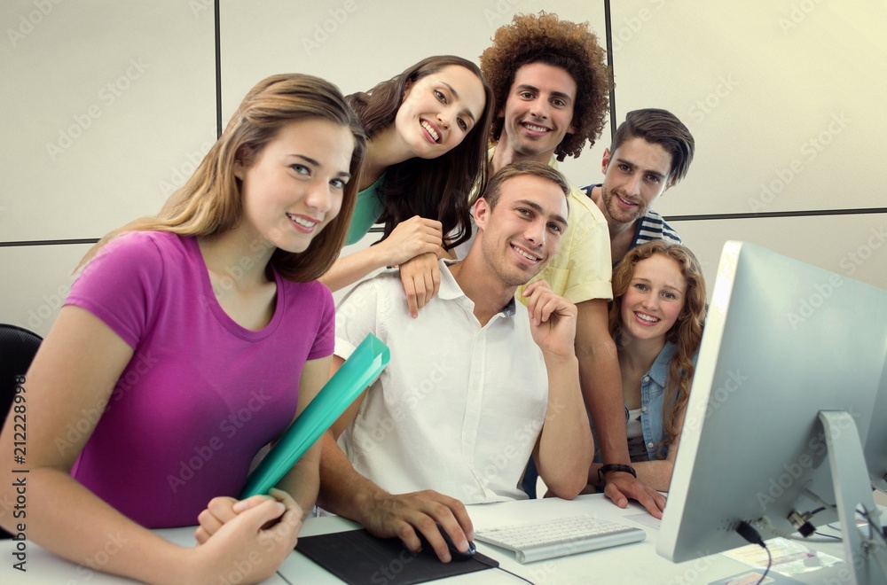 Composite image of smiling students in computer class Composite image of smiling students in computer class