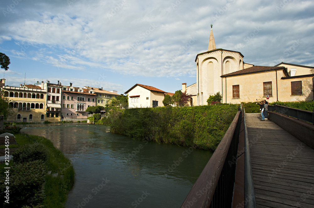 Turists photograph the city of Sacile also known as 