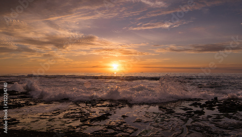 Powerful wave and sunrise at Newcastle beach Australia