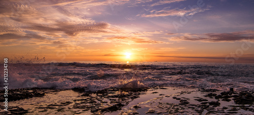 Powerful wave and sunrise 