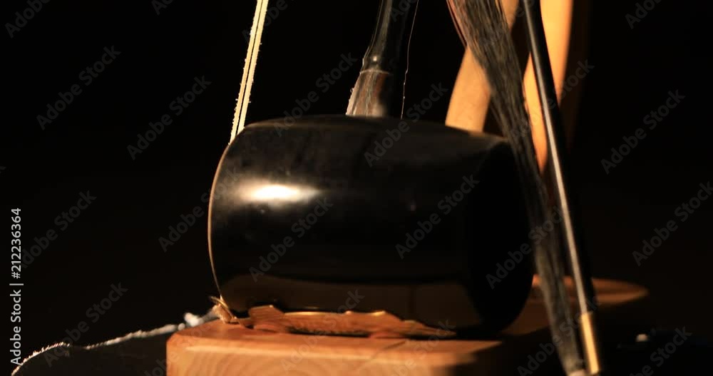 Tilt up shot of Haegeum which is the Korean traditional string instrument Tilt up shot of Haegeum which is the Korean traditional string instrument