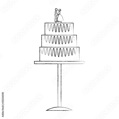 bride and groom dolls in wedding cake