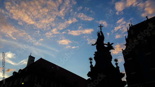silhouette of Church statues at sunset against the sky in Wroclaw on Cathedral island