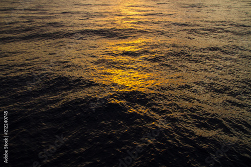 Sunsets lights reflections on the waves