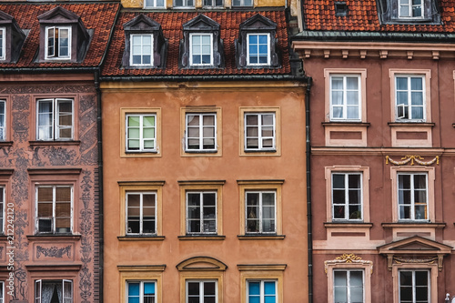 old beautiful town houses; Sights of Warsaw;colorful houses with windows; © Kaminski Vadim