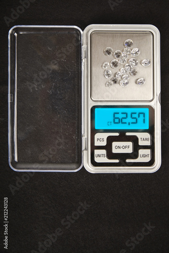 More then 60 carats of smuggled diamonds on little digital scale