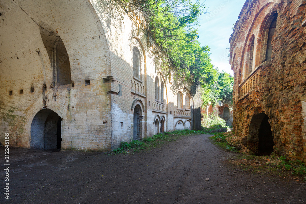 old ruined buildings with arches at sunny day