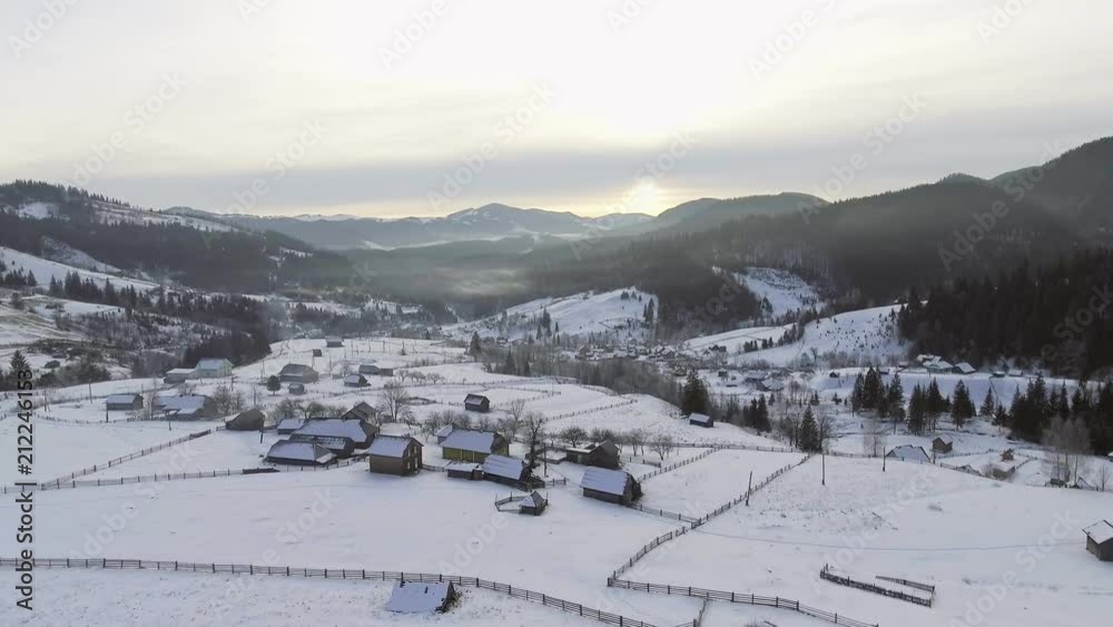 AERIAL: Flight over the mountain in winter AERIAL: Flight over the mountain in winter
