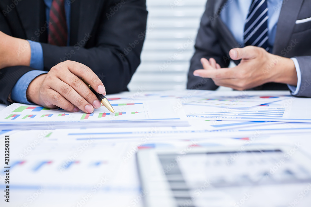 Business team financial inspector and secretary making report,tax,calculating or checking balance, Audit concept at working with plan and analyzing investment charts at workplace. Business team financial inspector and secretary making report,tax,calculating or checking balance, Audit concept at working with plan and analyzing investment charts at workplace.