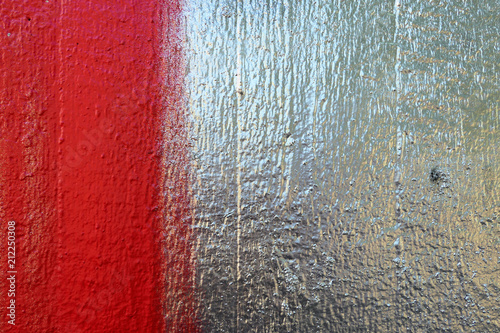 graffiti texture on wooden material in silver red. backdrop
