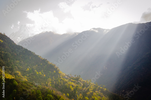 Panoramic mountain landscape. Mountain landscape in the Himalayas. The house on the way to the foothill of Annapurna range, Nepal Himalayas. travel concept and camping © iphotothailand