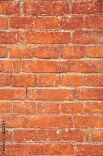 The texture of the ancient brick wall of the 19th century. Brick orange masonry.