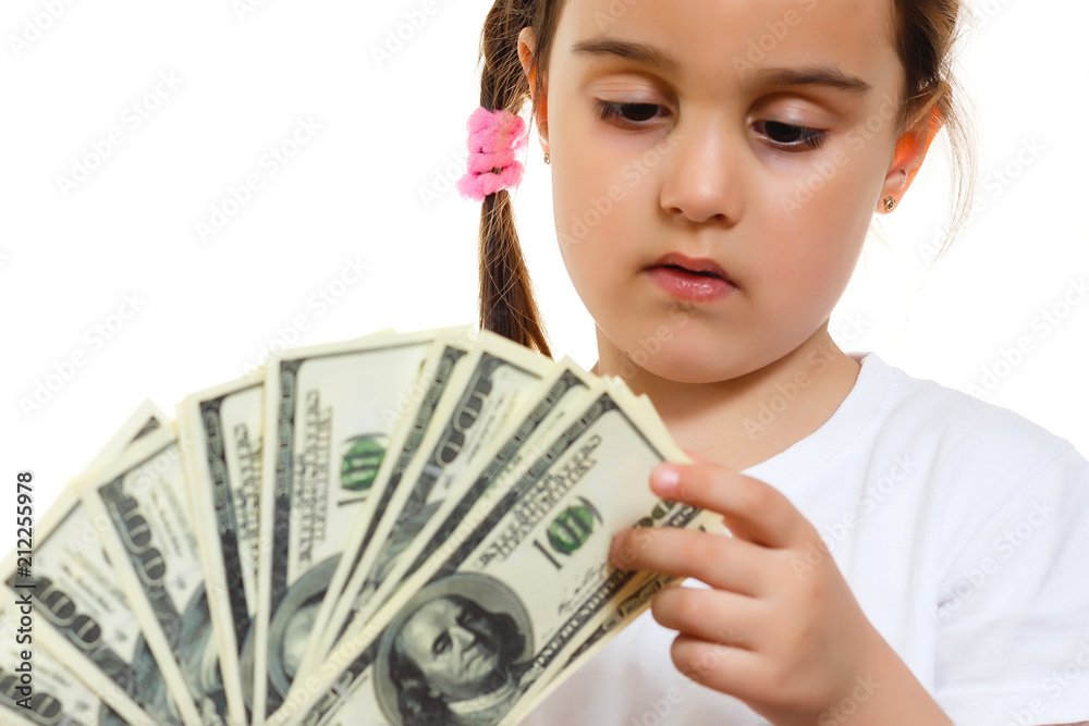 Happy little girl with money dollar isolated Happy little girl with money dollar isolated