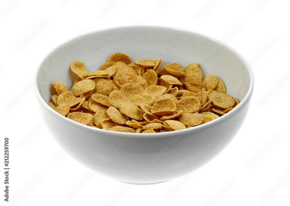 Cornflakes in a white bowl isolated on white background. Cornflakes in a white bowl isolated on white background.