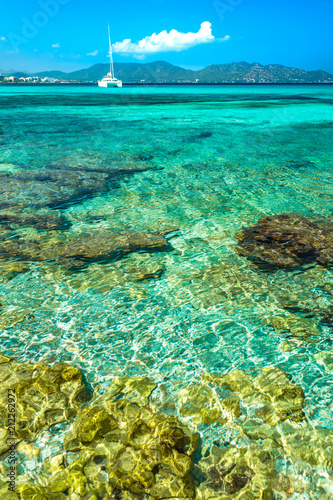 Beautiful transparent clear sea water at seaside of Cala Millor on Mallorca island, Spain